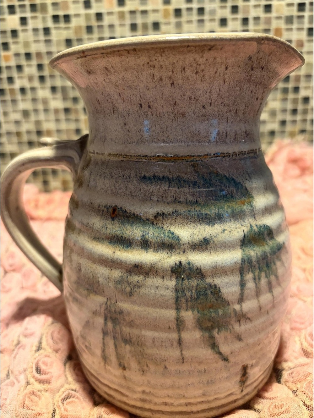 This is a vintage studio pottery ceramic piece with an incised maker's signature